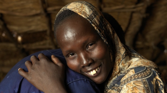Woman smiling.